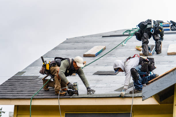 Professional Flat Roof Repair technician working in West Millbury, MA